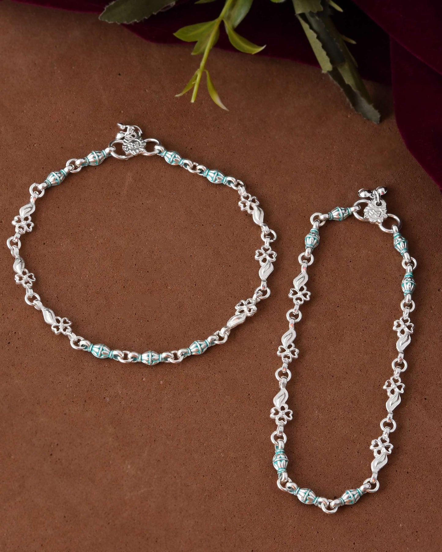 Jewels Nest Set of 2 Silver-Plated Anklets with Green Beads & Leaf Motifs - Swadesiicart