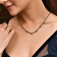 Jewels Nest Elegant Black Beads Mangalsutra with Green & Red Stone Drops – Silver Finish - Swadesiicart