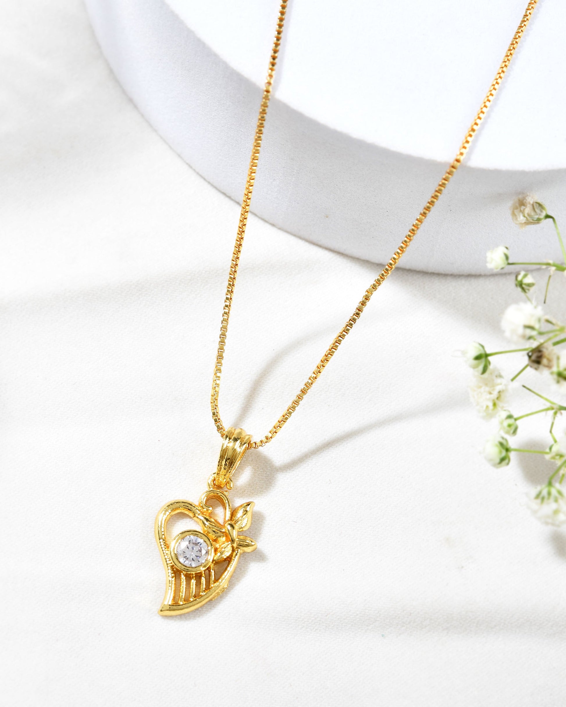 Jewels Nest Elegant Gold-Polished Couple Pendant Set | Swadesiicart