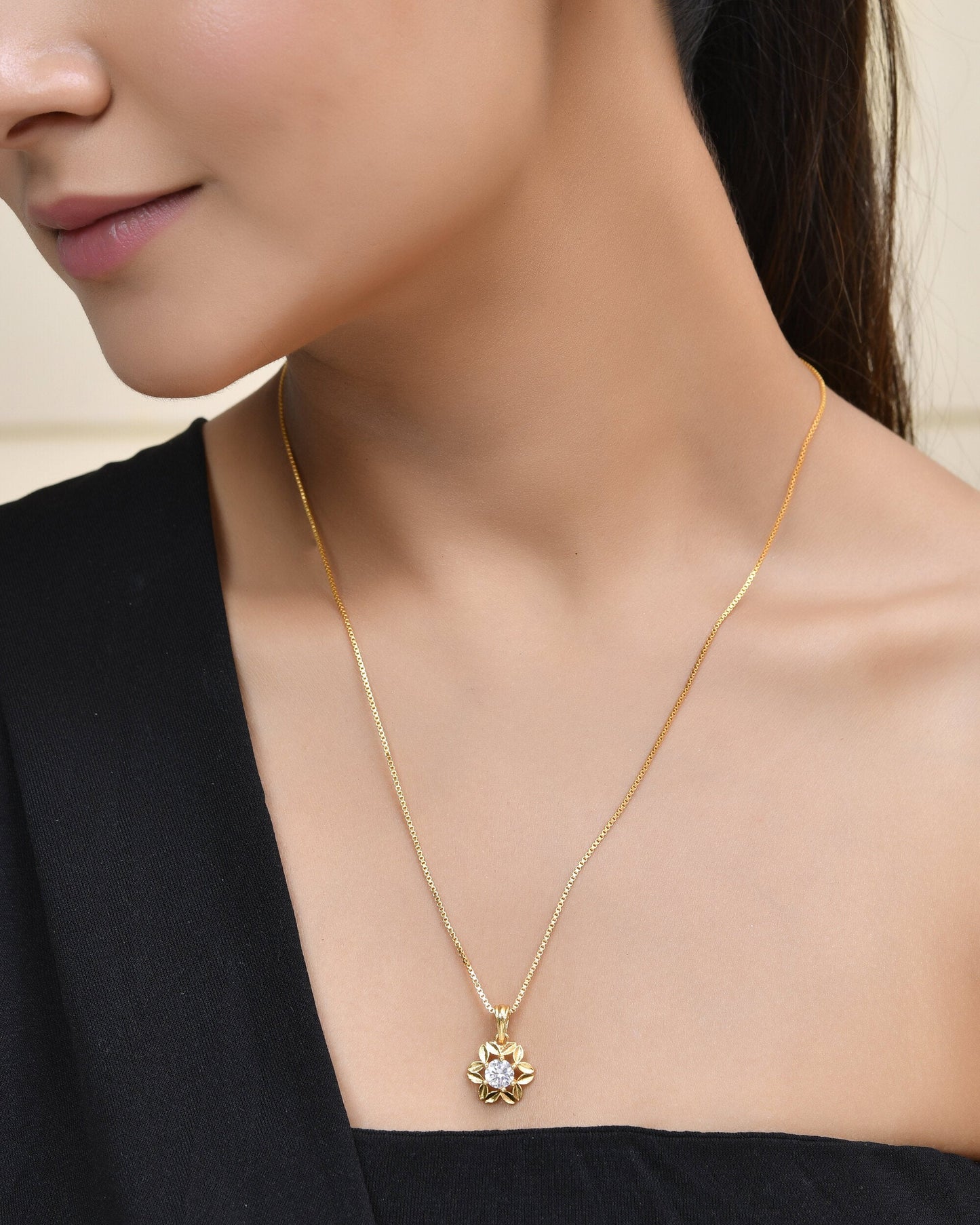 Jewels Nest Elegant Gold-Polished Floral Pendant with Sparkling Stone | Swadesiicart