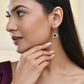 Jewels Nest Stainless Steel Evil Eye Sunburst Dangle Earrings with Crystal Embellishments - Swadesiicart