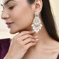 Jewels Nest Pearl-Embellished Kundan Teardrop Earrings with Floral Detailing - Swadesiicart