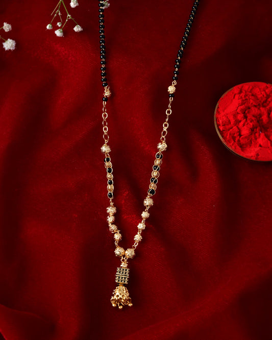 Jewels Nest Graceful Gold-Polished Black Bead Mangal Sutra with Intricate Pendant | Swadesiicart