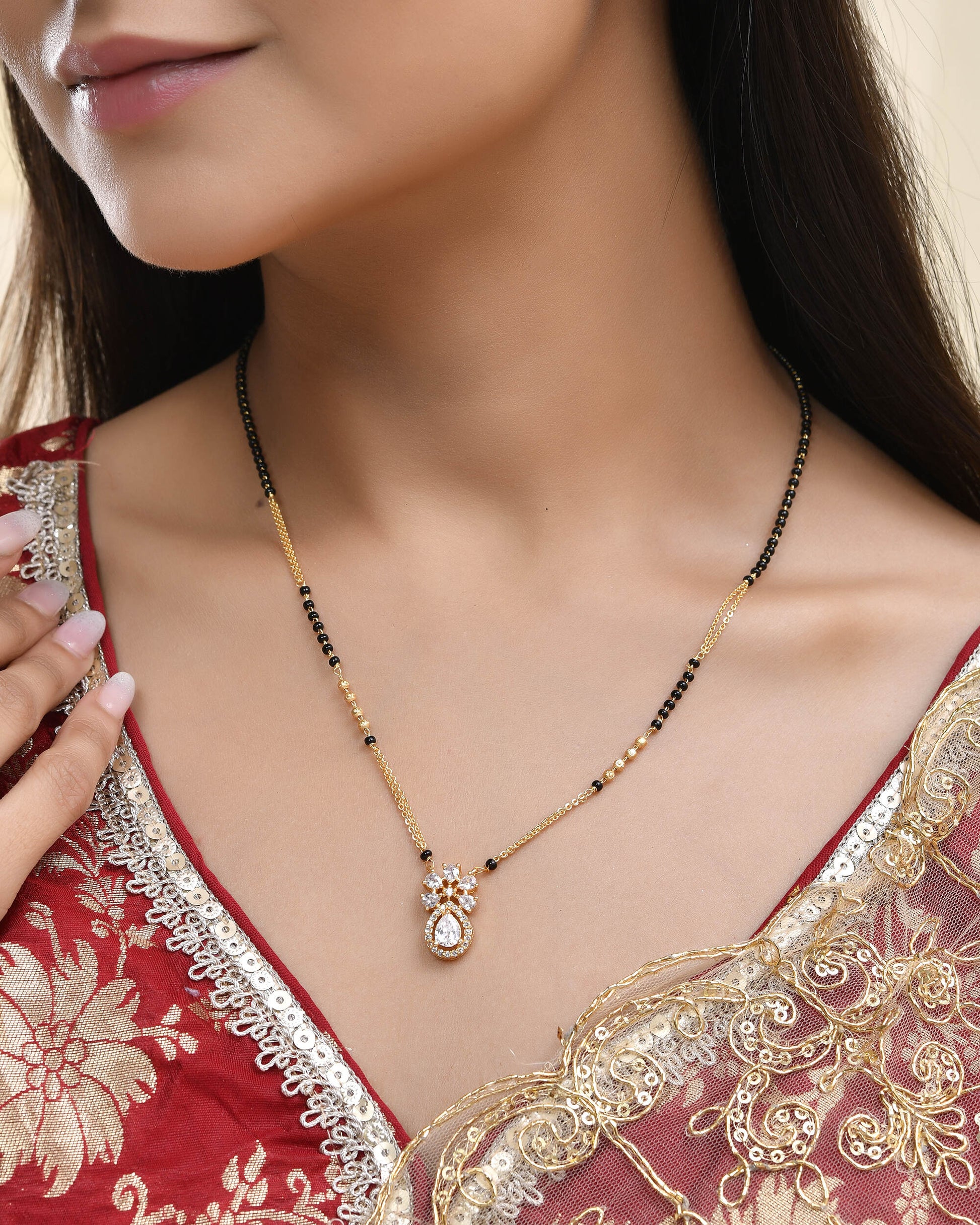 Jewels Nest Elegant Floral Pendant Gold-Polished Mangal Sutra | Swadesiicart