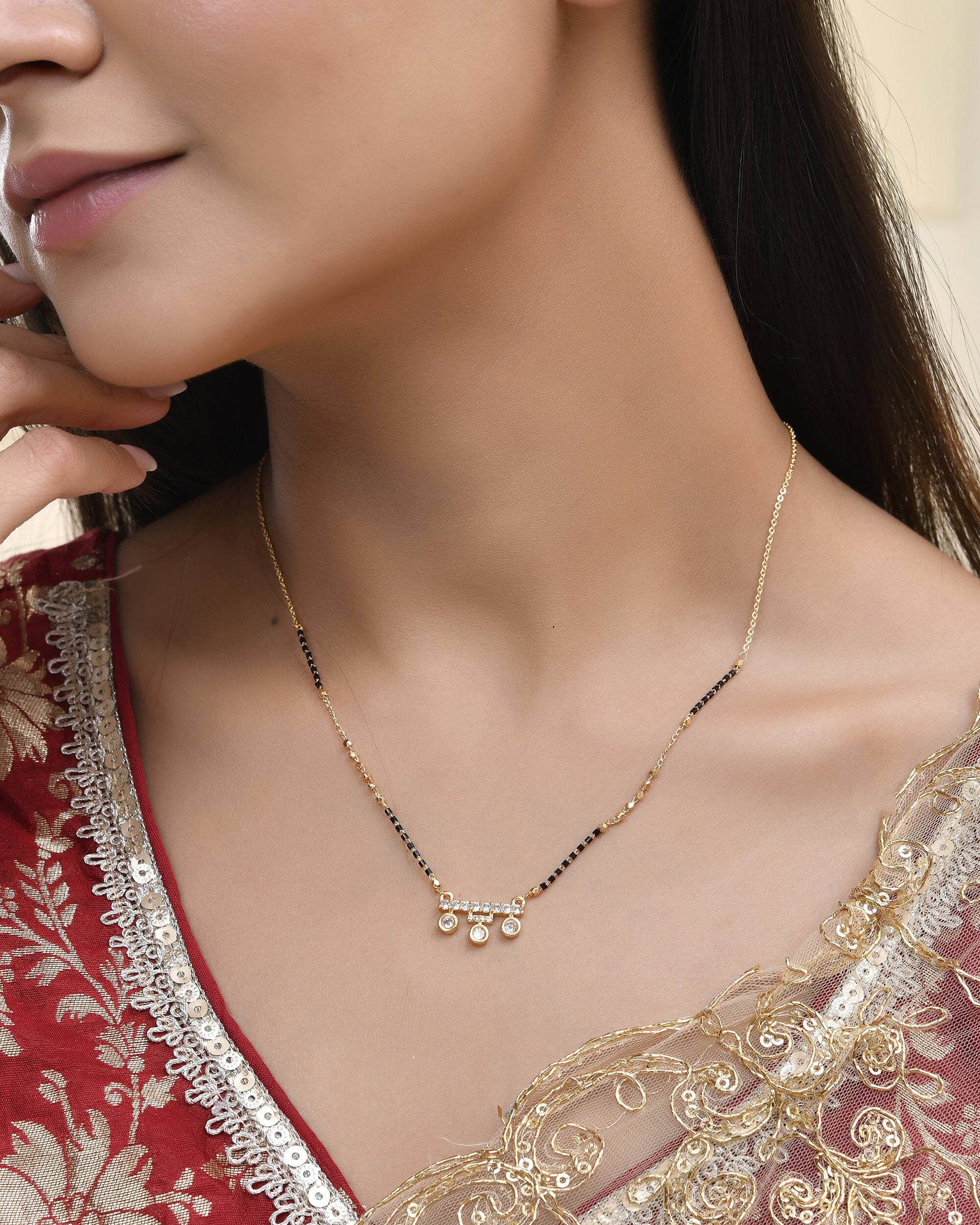Jewels Nest Sleek Crystal Drop Gold-Polished Mangal Sutra | Swadesiicart