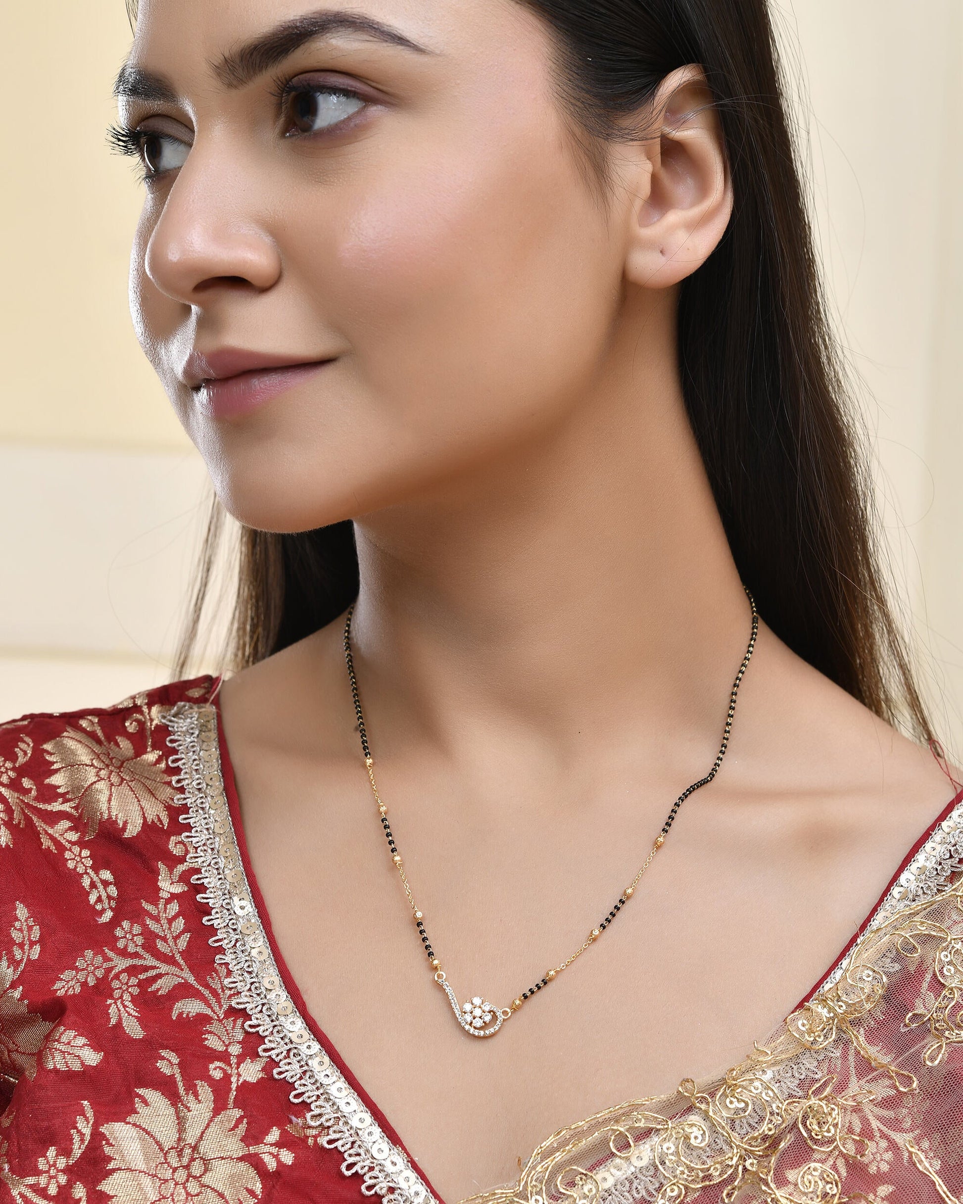 Jewels Nest Elegant Swirl Gold-Polished Mangal Sutra | Swadesiicart