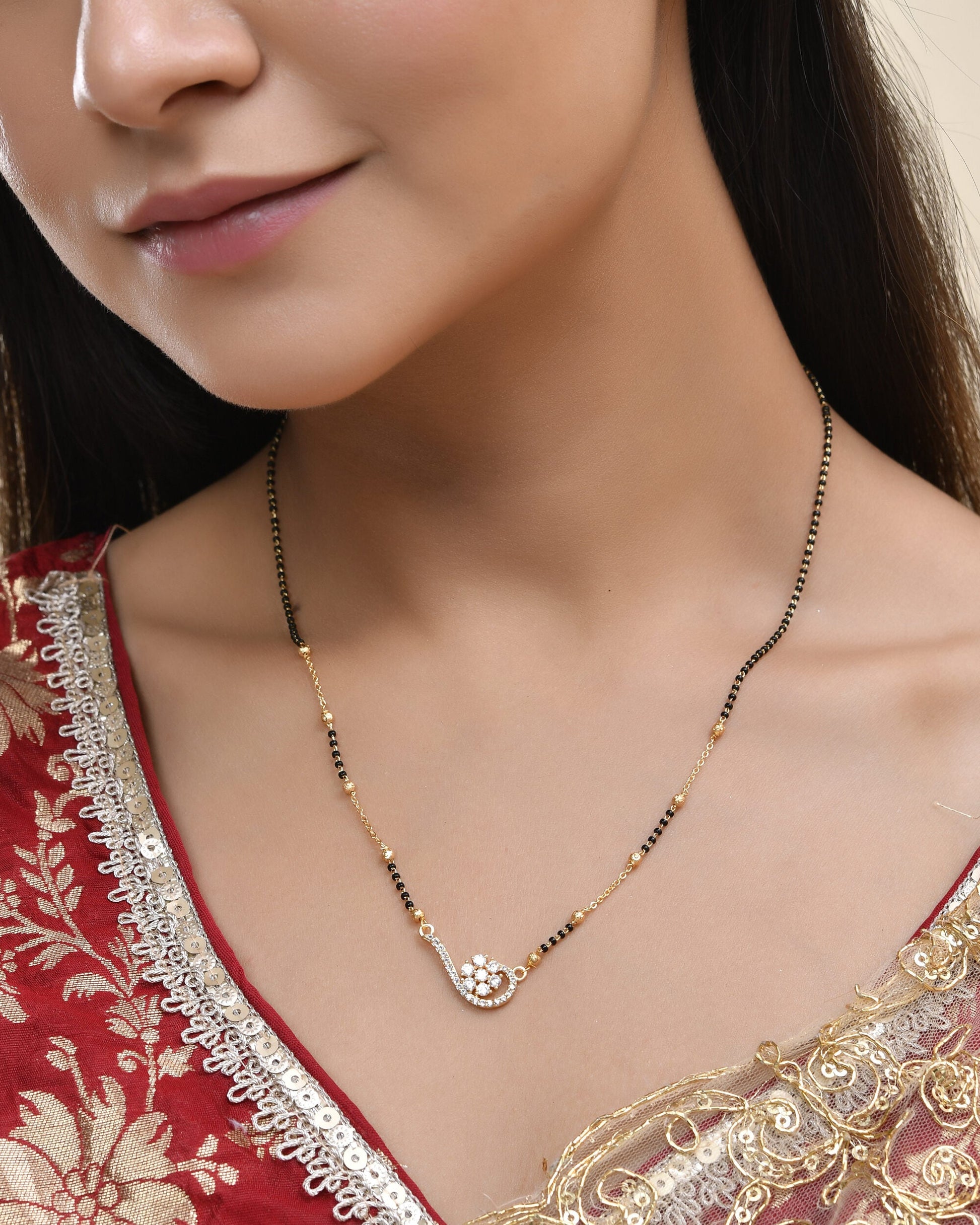 Jewels Nest Elegant Swirl Gold-Polished Mangal Sutra | Swadesiicart