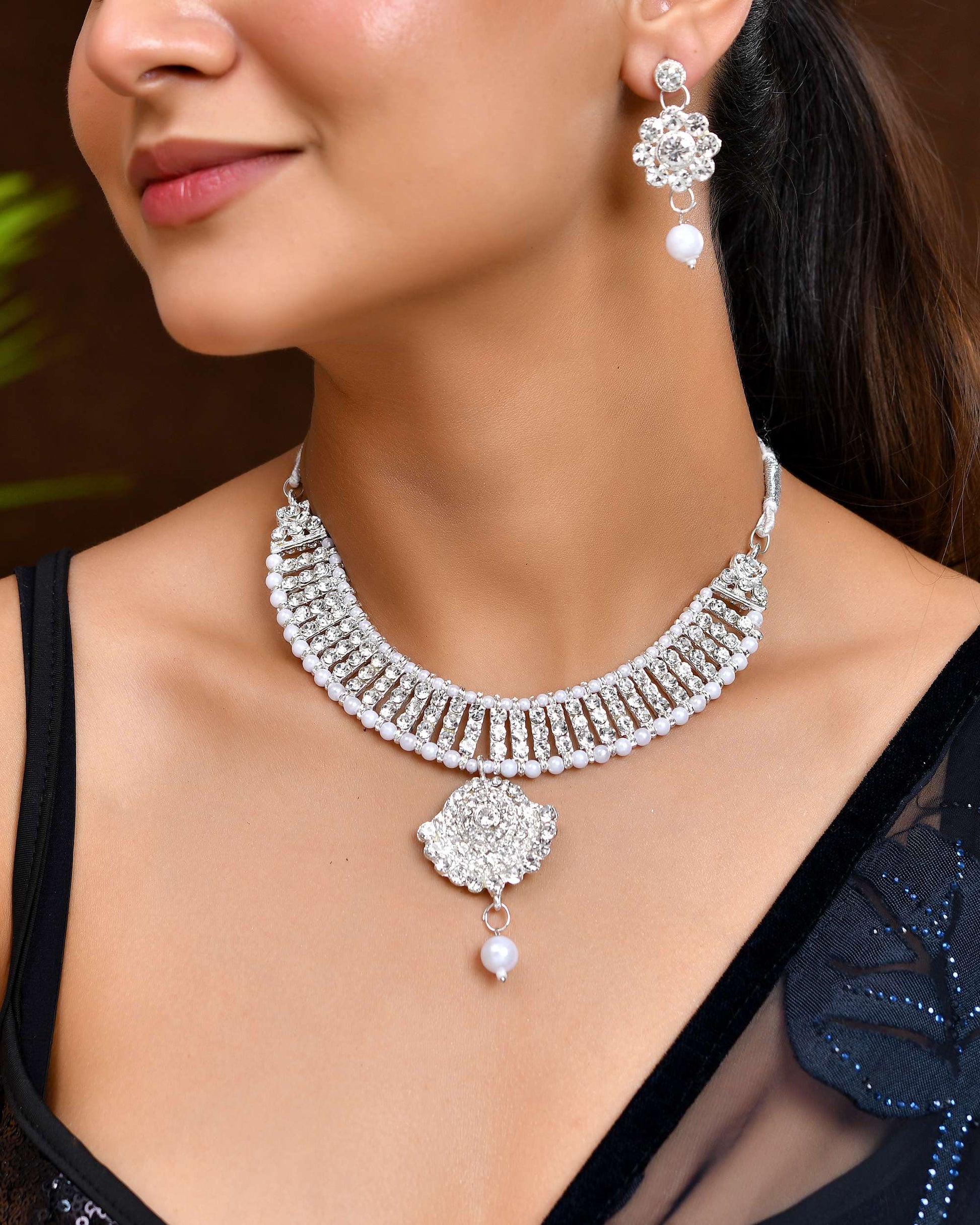 Jewels Nest Dazzling Occasion-Wear Set in Radiant Silver Finish and White Detailing - Swadesiicart