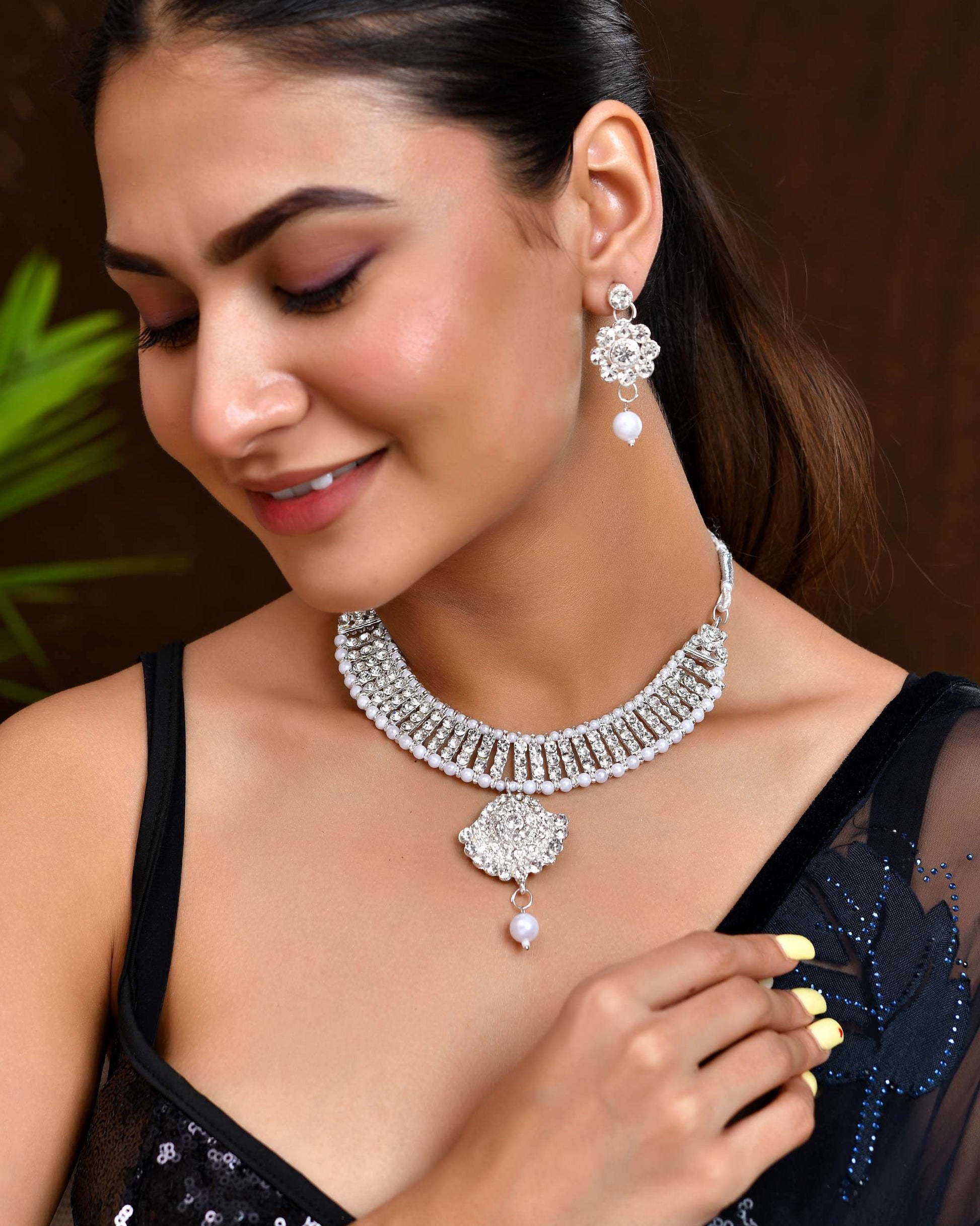 Jewels Nest Dazzling Occasion-Wear Set in Radiant Silver Finish and White Detailing - Swadesiicart
