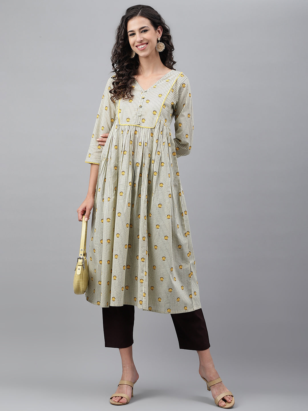 Janasya Women's Light Yellow Cotton Floral Printed Party Flared Kurta | Swadesiicart