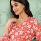 Janasya Women's Orange Crepe Digital Floral Print Casual Peplum Top | Swadesiicart