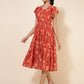 Janasya Rust Georgette Abstract Printed Tiered Casual Dress | Swadesiicart