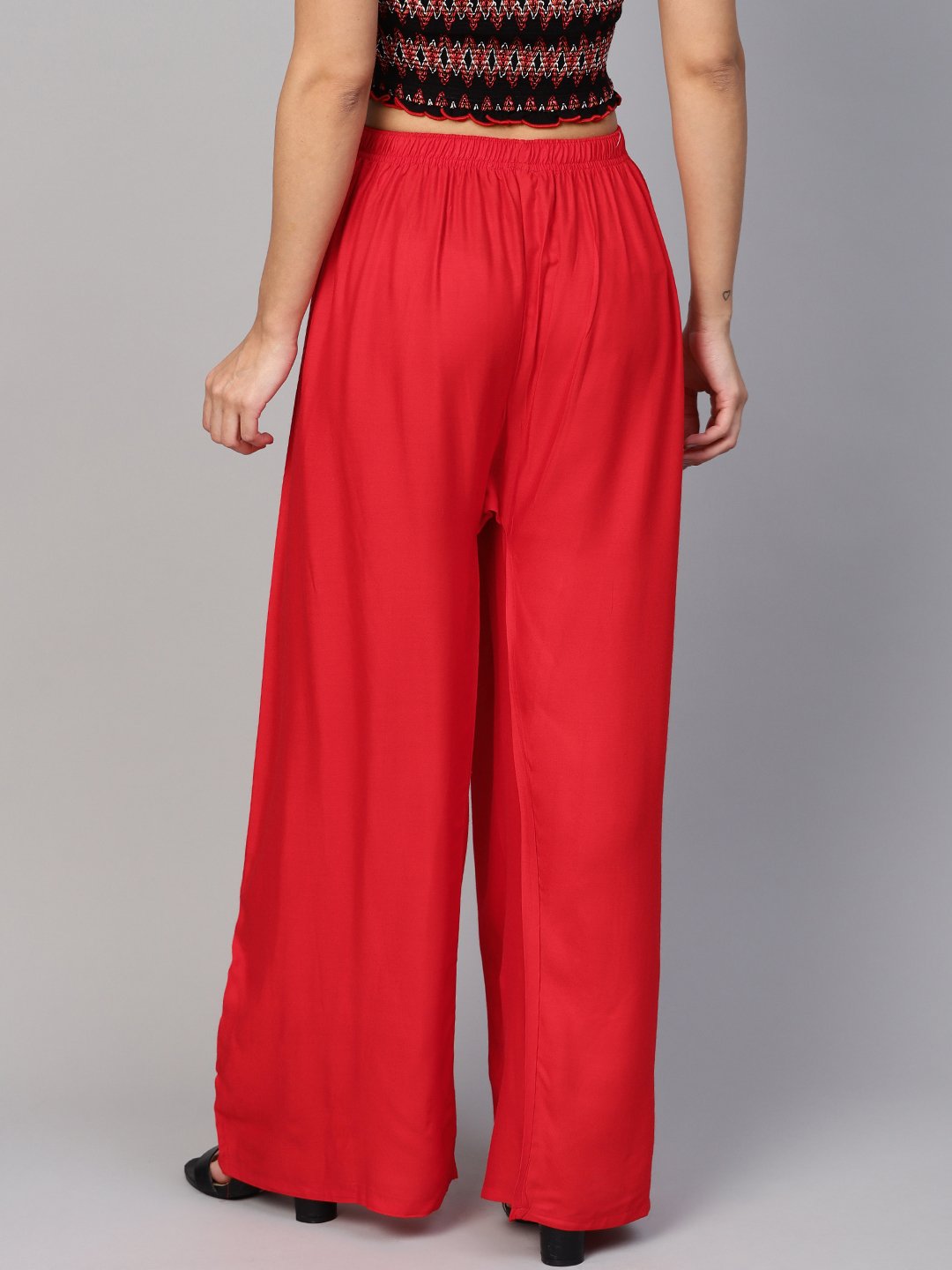 Jompers Women Red Solid Straight Palazzos | Swadesiicart