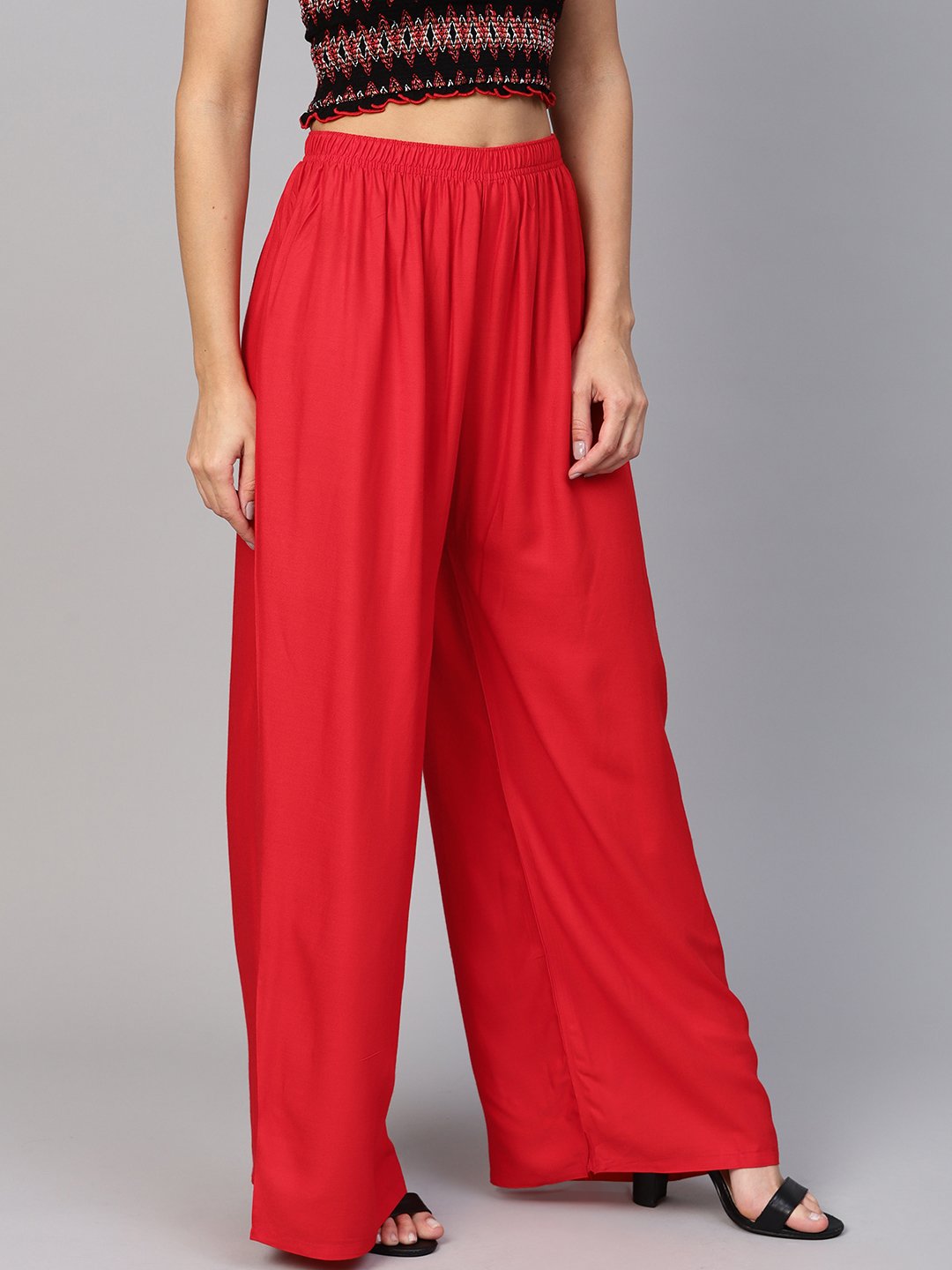 Jompers Women Red Solid Straight Palazzos | Swadesiicart