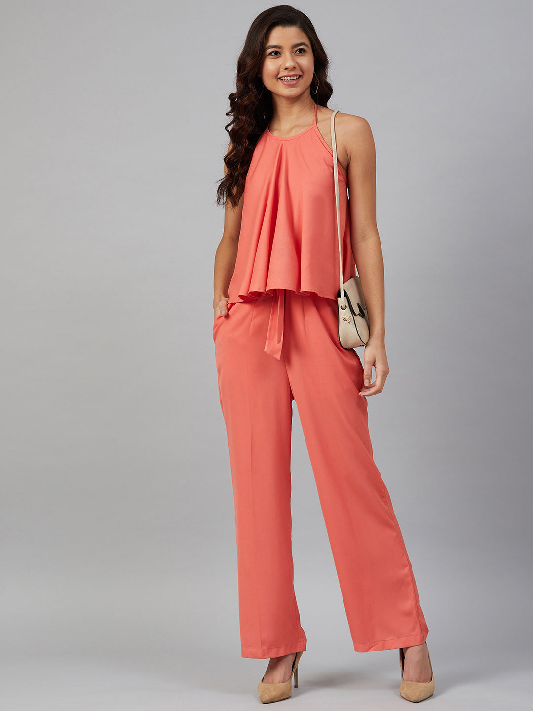 Jompers Women Peach-Coloured Solid Halter Neck Basic Jumpsuit - Swadesiicart