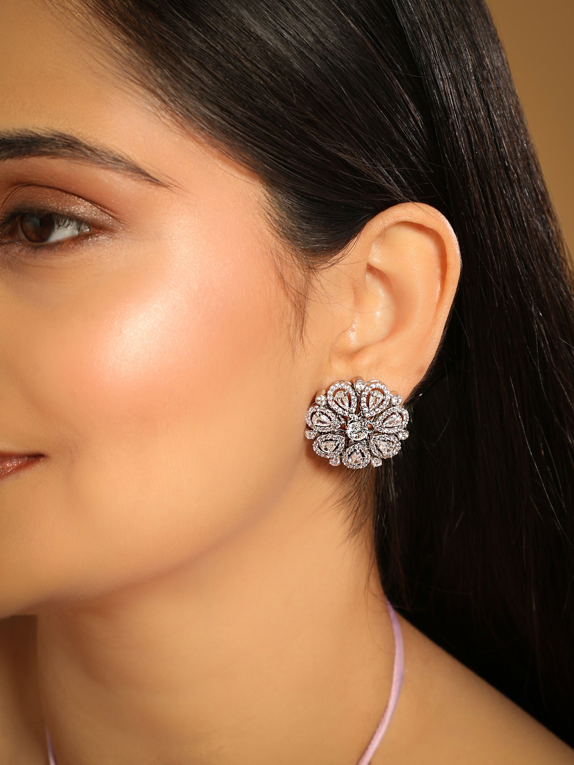 Nuyug Rhodium-Plated Zircon Studded Floral Statement Stud Earrings | Swadesiicart