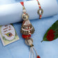 NVR Women & Men Set of 2 Gold & Red Kundan-Studded Bhaiya Bhabhi Rakhi With Roli Chawal & Chocolate | Swadesiicart