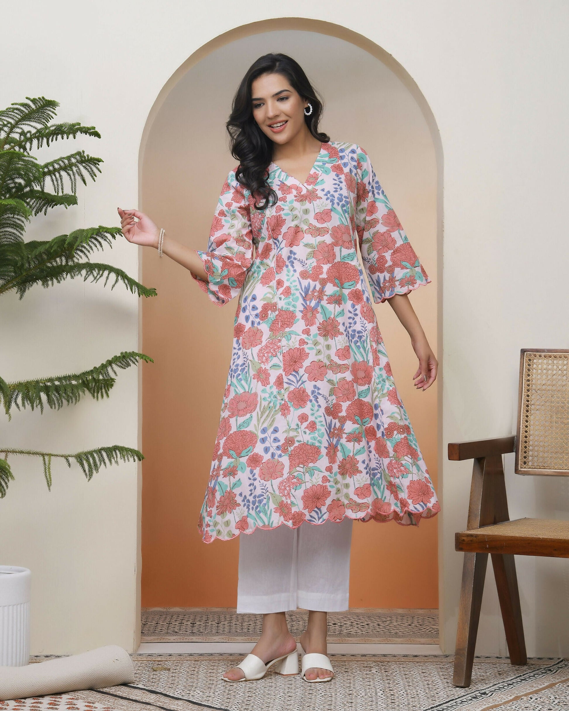 Vaasva Women Peach Floral Cotton Printed Flare Kurti With Pant | Swadesiicart