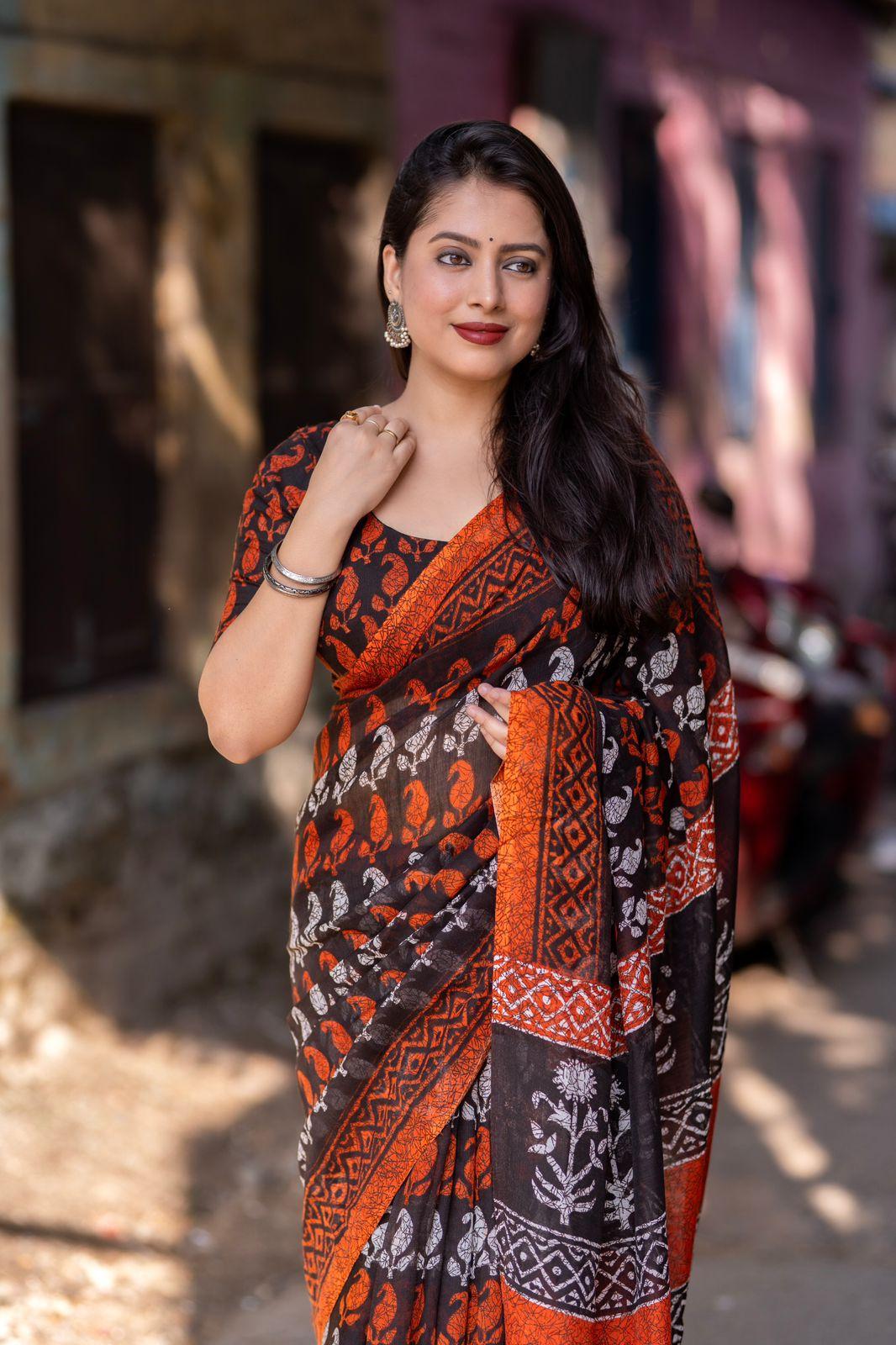 Orange Linen Blend Ethnic Motifs Saree with Unstitched Blouse - Hiral Fashion | Swadesiicart