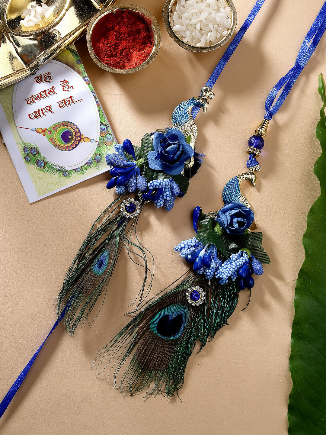 NVR Women & Men Set of 2 Blue Peacock Design Bhaiya Bhabhi Rakhi With Roli Chawal & Chocolate | Swadesiicart