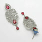 NVR Women Silver Plated & Maroon Cz Stone Handcrafted Jewellery Set - Swadesiicart