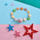 trueBrowns X Voylla Colourful Flowers Kid's Thread Rakhi For Kids | Swadesiicart