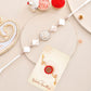 trueBrowns X Voylla White Pearls And Shell Men's Rakhi For Brother | Swadesiicart