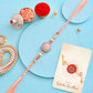 trueBrowns X Voylla Men's Orange Thread Traditional Design White Pearls Rakhi For Brother | Swadesiicart