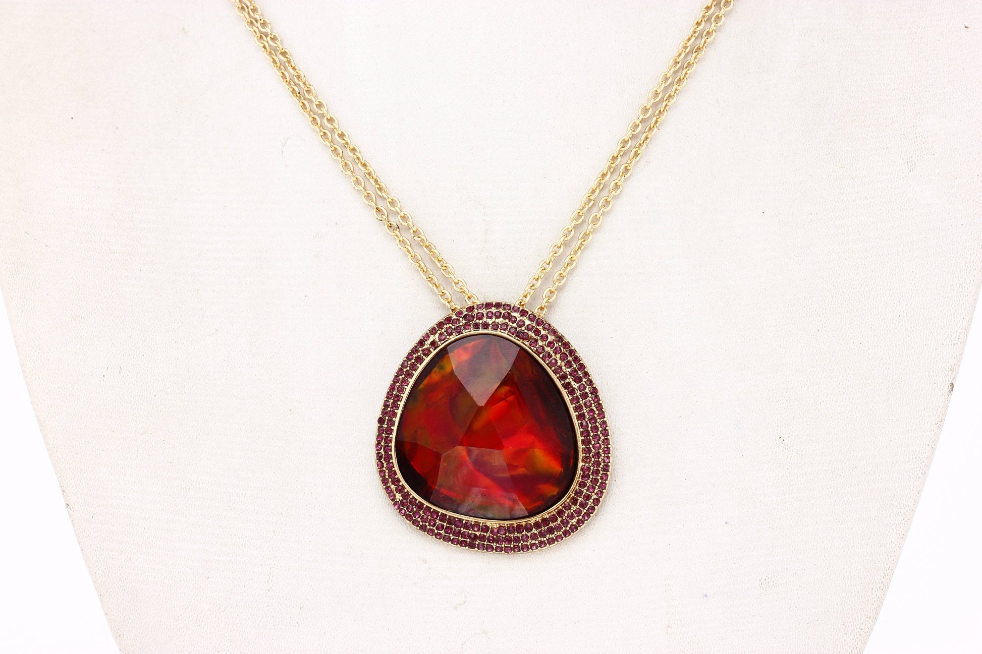 Gold-Polished Alloy Assymetric Stone Studded Pendant Necklace - The Pari | Swadesiicart