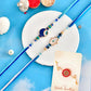 trueBrowns X Voylla Pack Of 2 Evil Eye Hamsa Charms Men's Rakhis | Swadesiicart