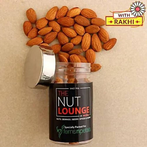 Auspicious Ganesha Rakhi And Almonds Jar