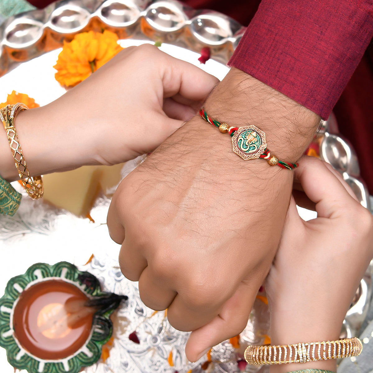 trueBrowns X Voylla Traditional Om And Lord Ganesha Motif Thread Rakhi | Swadesiicart