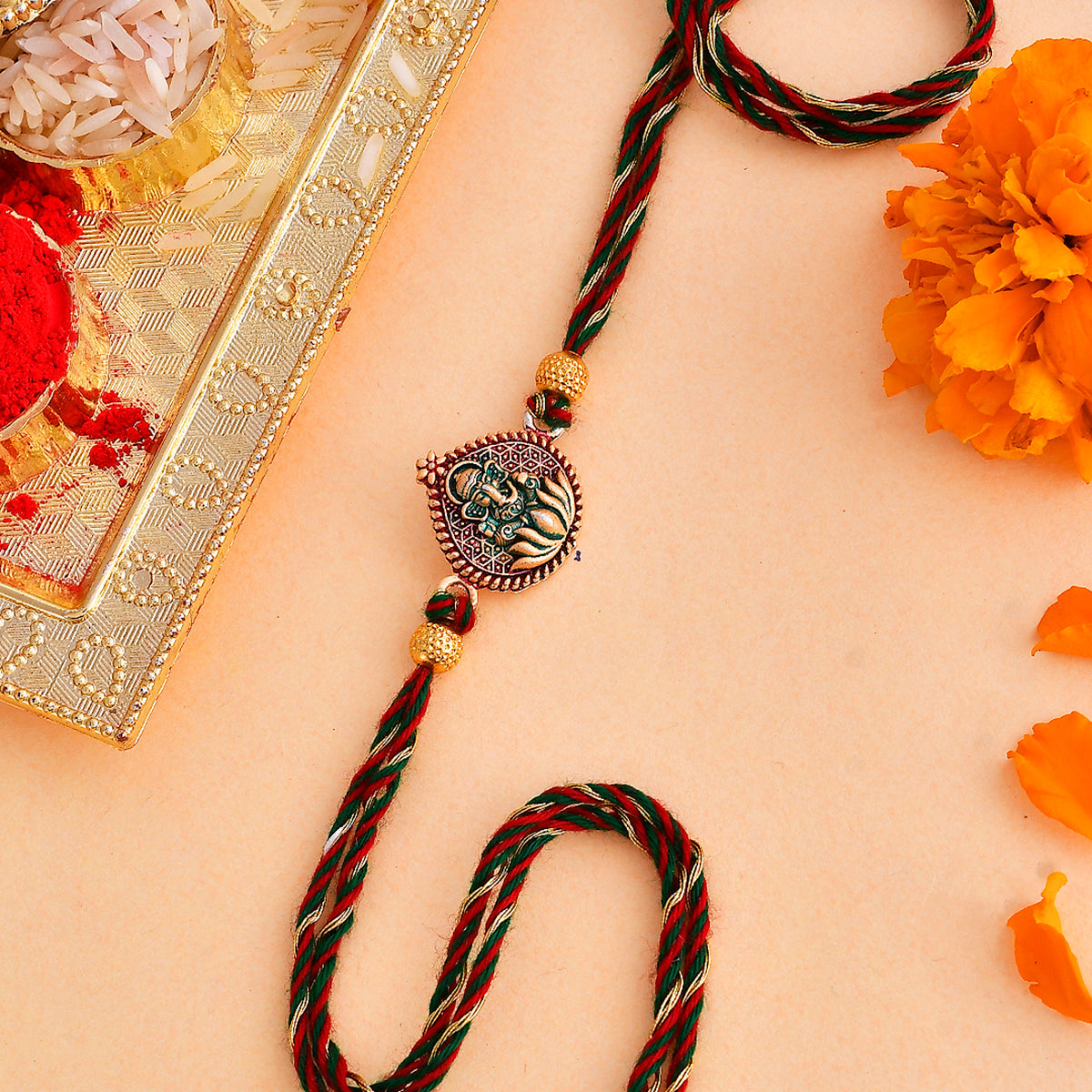 trueBrowns X Voylla Lord Ganesha Colorful Enameled Ethnic Rakhi | Swadesiicart