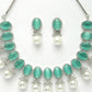 NVR Women's Silver-Plated Green American Diamond Studded Handcrafted Jewellery Set - Swadesiicart