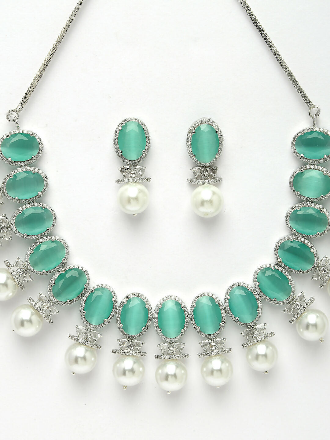 NVR Women's Silver-Plated Green American Diamond Studded Handcrafted Jewellery Set - Swadesiicart