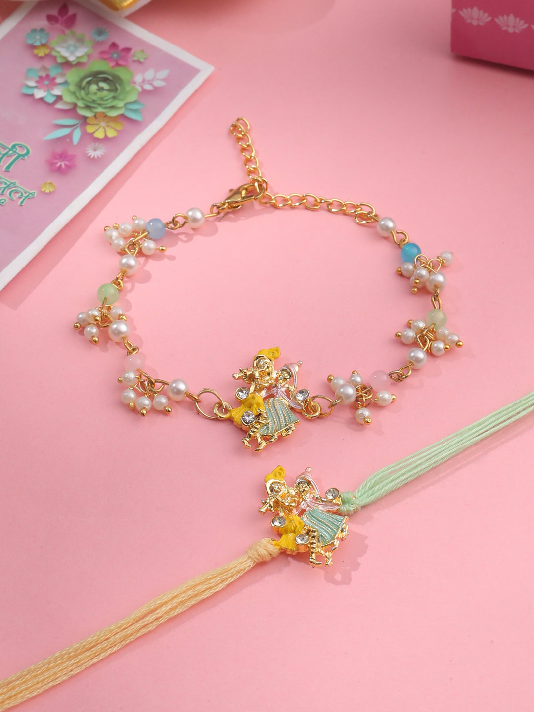NVR Set of 2 Multicolor Gold Toned Radha Krishna Beaded Bhaiya Bhabhi Rakhi with Roli Chawal Chandan & Mishri - Swadesiicart