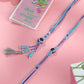 NVR Set of 2 Blue Evil Eye Artificial Beads Bhaiya Bhabhi Rakhi with Roli Chawal Chandan & Mishri - Swadesiicart