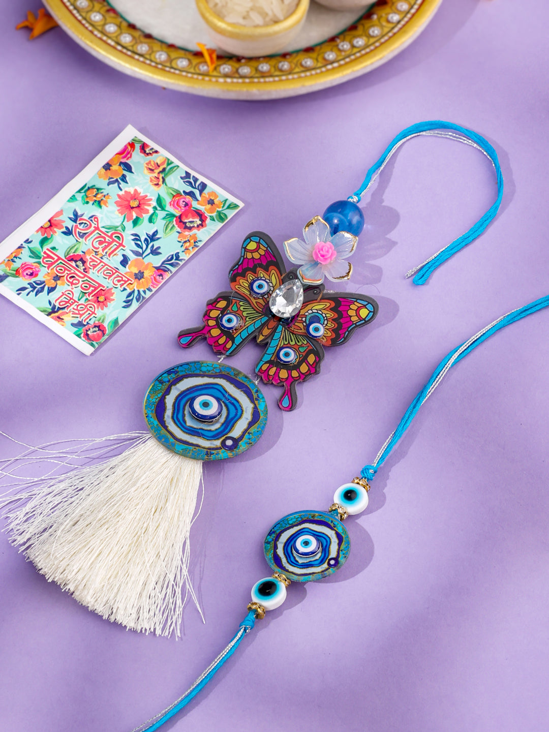 NVR Blue Evil Eye Artificial Beads Set of 2 Bhaiya Bhabhi Rakhi with Roli Chawal Chandan & Mishri - Swadesiicart
