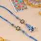 NVR Set of 2 Blue Artificial Beads Evil Eye Bhaiya Bhabhi Rakhi with Roli Chawal Chandan & Mishri - Swadesiicart