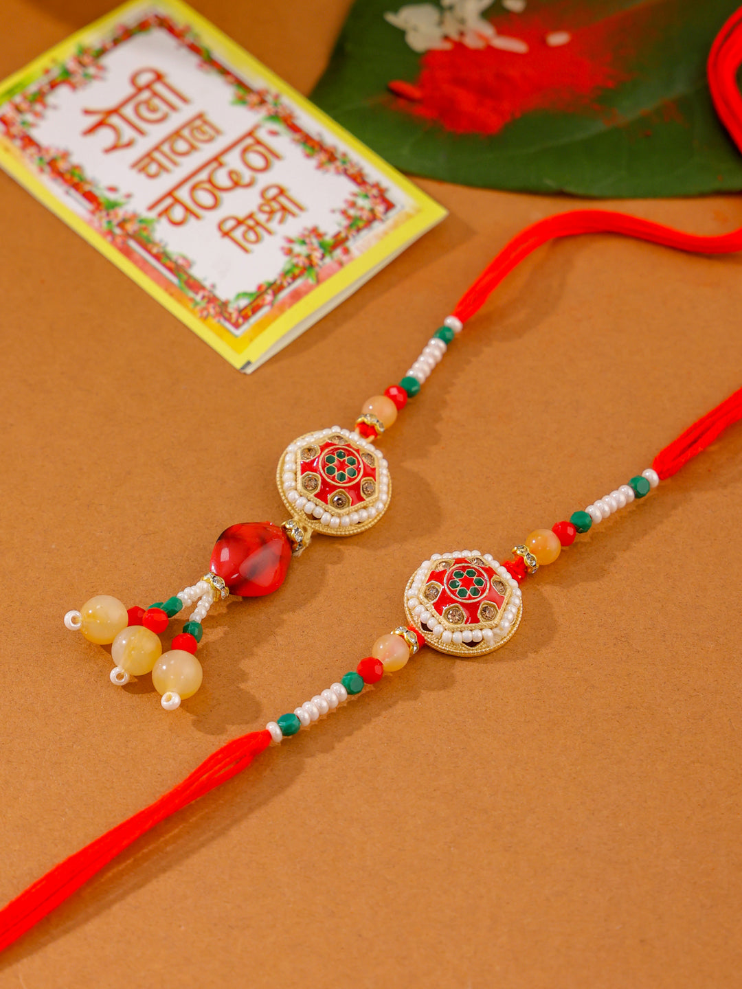 NVR Set of 2 Red Artificial Stones and Beads Bhaiya Bhabhi Rakhi with Roli Chawal Chandan & Mishri | Swadesiicart
