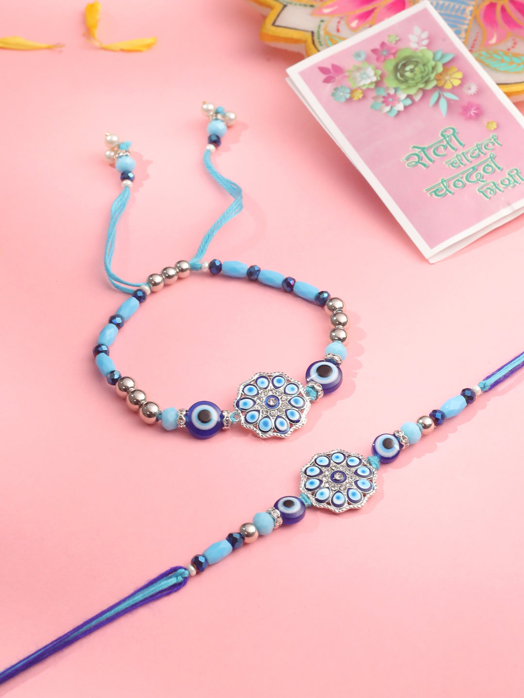 NVR Set of 2 Blue Evil Eye Floral Design Bhaiya Bhabhi Rakhi with Roli Chawal Chandan & Mishri | Swadesiicart