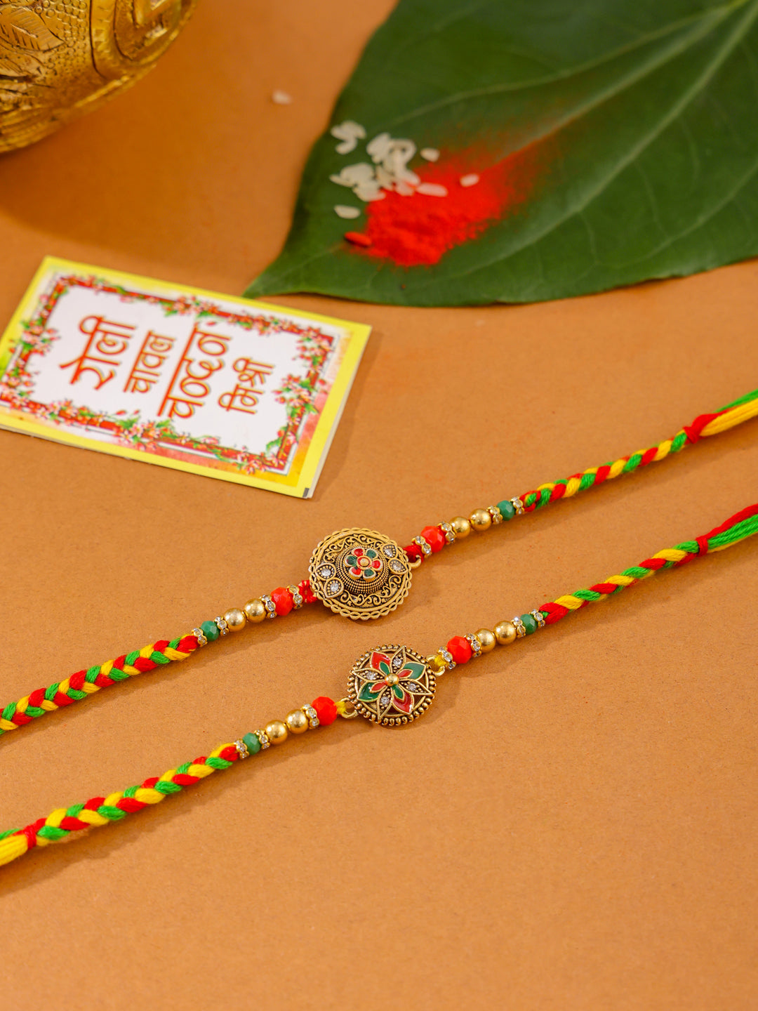 NVR Men Set of 2 Multicolor Floral Design Artificial Stones Thread Rakhi with Roli Chawal Chandan & Mishri | Swadesiicart
