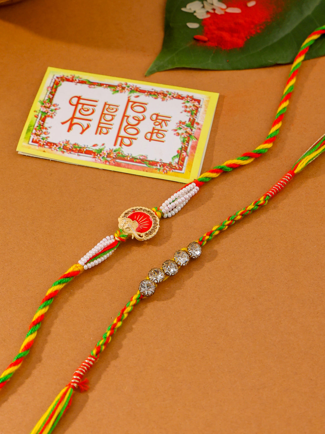 NVR Men Set of 2 Religious Designer Multicolor Artificial Stones Thread Rakhi with Roli Chawal Chandan & Mishri - Swadesiicart