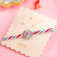 NVR Men Floral Design Multicolor Artificial Stones & Pearls Thread Rakhi with Roli Chawal Chandan & Mishri - Swadesiicart