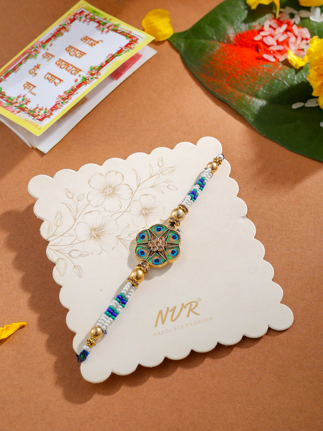 NVR Men Peacock Design Multicolor Artificial Stones & Pearls Thread Rakhi with Roli Chawal Chandan & Mishri | Swadesiicart