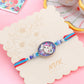 NVR Men Red & Blue Ganesh Ji Thread Rakhi with Roli Chawal Chandan & Mishri - Swadesiicart
