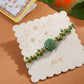 NVR Men Green Artificial Beads Round Shape Thread Rakhi with Roli Chawal Chandan & Mishri - Swadesiicart