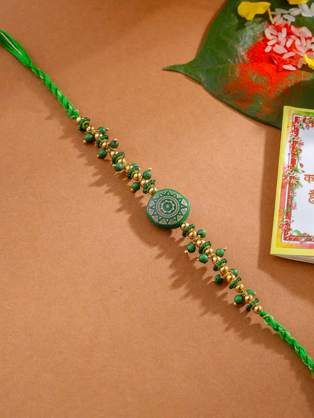 NVR Men Green Artificial Beads Round Shape Thread Rakhi with Roli Chawal Chandan & Mishri - Swadesiicart