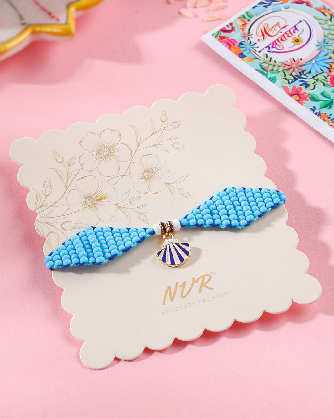 NVR Men Blue Pearls Unique Design Thread Rakhi with Roli Chawal Chandan & Mishri - Swadesiicart