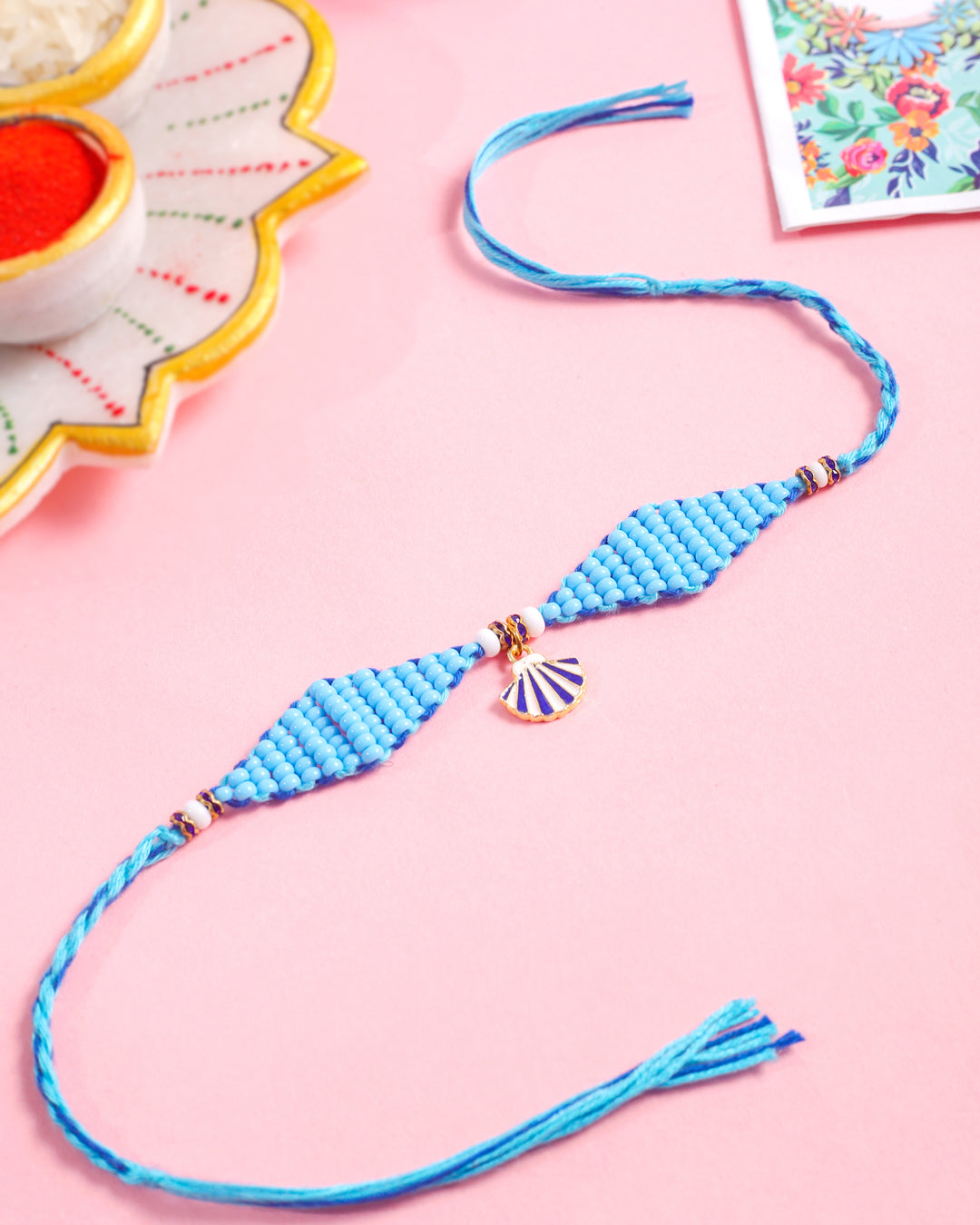 NVR Men Blue Pearls Unique Design Thread Rakhi with Roli Chawal Chandan & Mishri - Swadesiicart